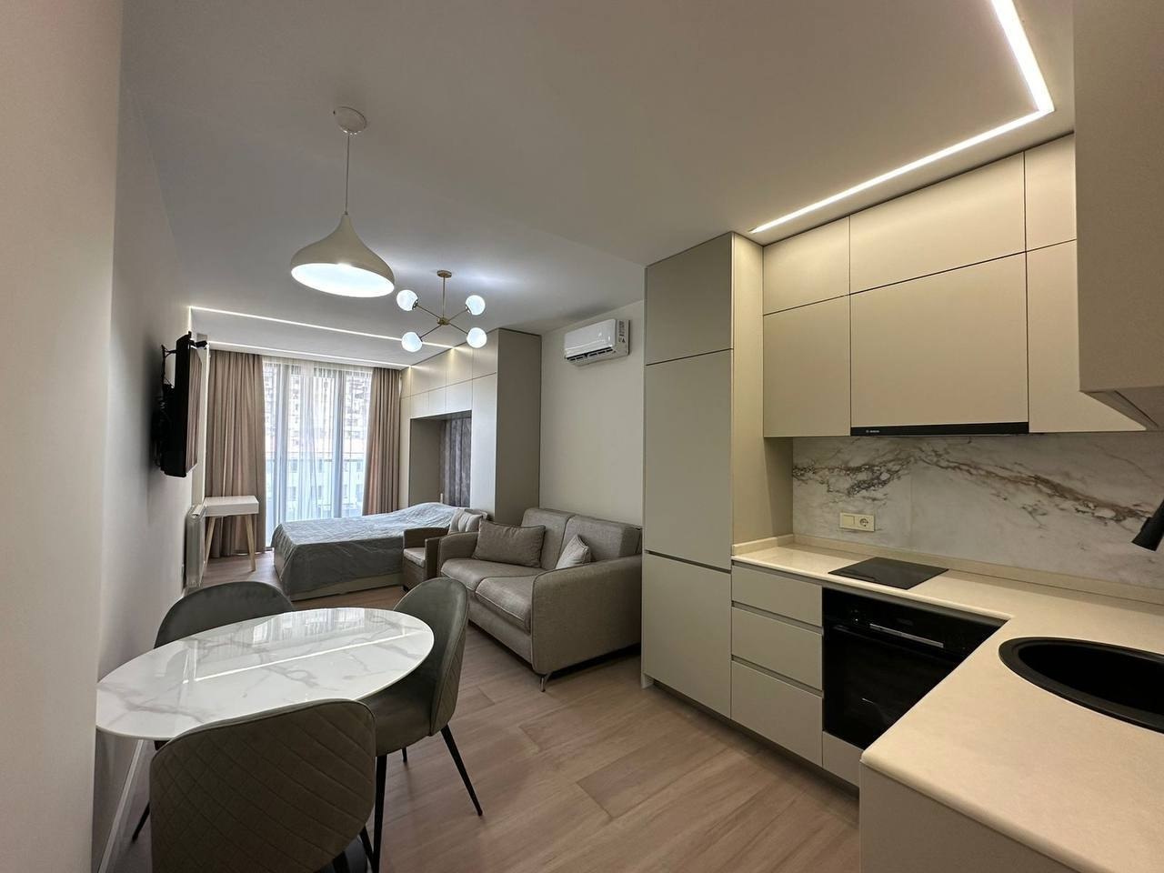 студию по улице Инасоридзе,21 Next Apartment